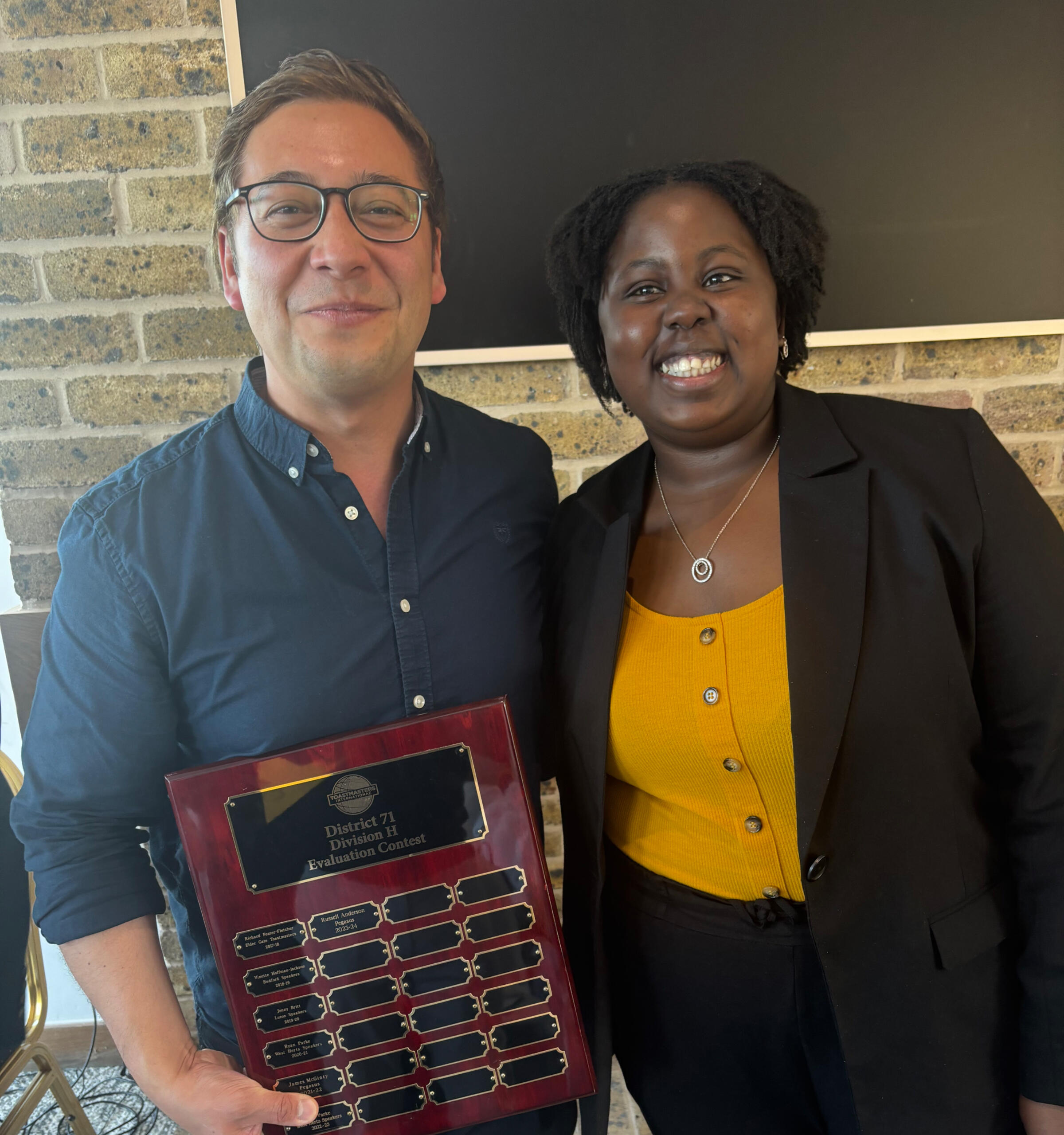Division H Winners Toastmasters International Speech and Evaluation Contest Division H Winners; Geoff Huntington and Colletor Gumbo.